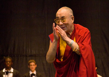 The Dalai Lama speaking on stage in Centennial Olympic Park.