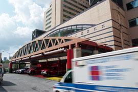 An ambulance rushes toward Grady Hospital