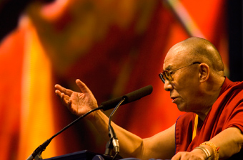 The Dalai Lama speaks to the crowd in Centennial Olympic Park