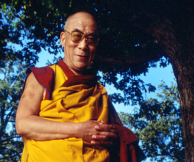 His Holiness the Dalai Lama, smiling onstage in Centennial Olympic Park