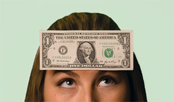 Girl with a dollar bill on her mind -- literally