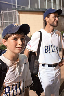 The author with his son at a baseball game