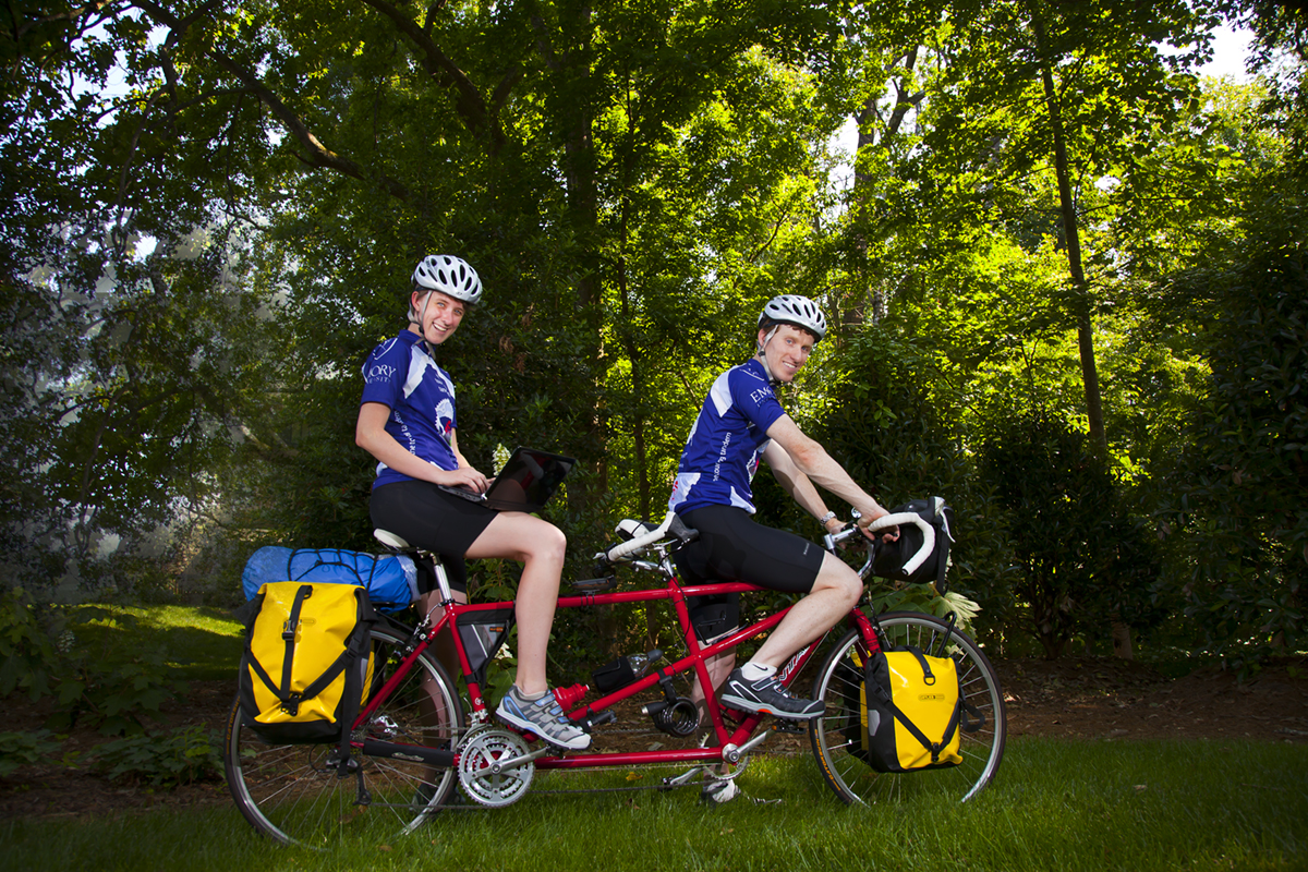 Cyclists on tandem bike before setting out on their trip